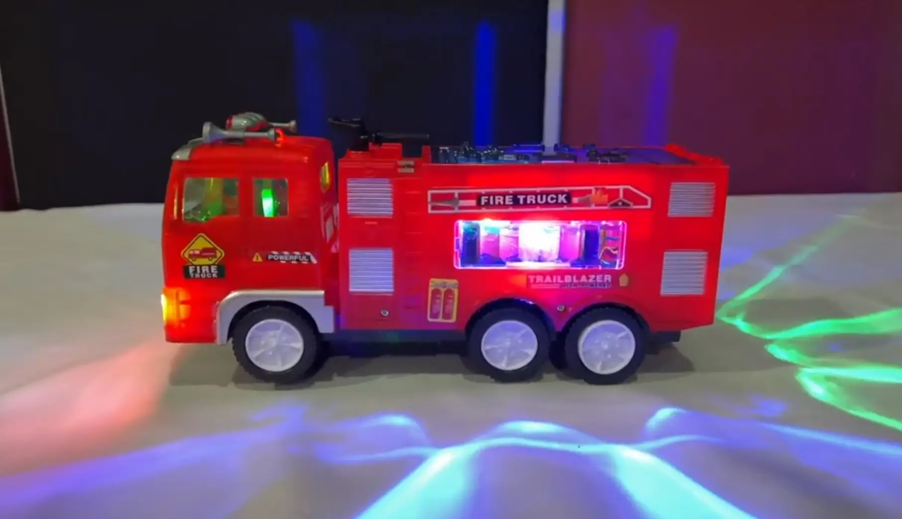 Electric Fire Truck Kids Toy - With Bright Flashing 4D Lights & Real Siren Sounds | Bump And Go Firetruck For Boys | Automatic Steering On Contact | Fire Engine Toy Trucks For Imaginative Play photo review