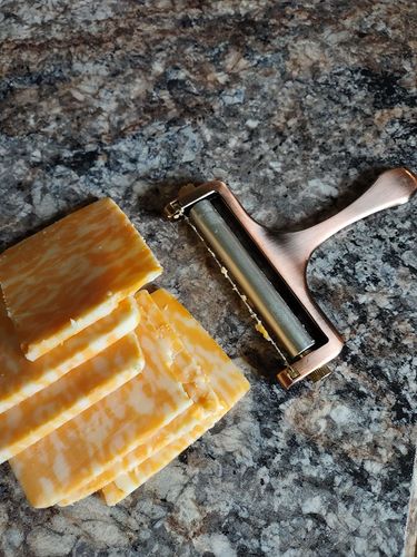 Adjustable Cheese Slicer - Cheese Shaver for Cooking photo review